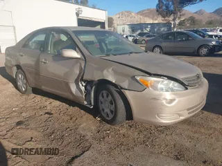2004 Toyota Camry LE with VIN 4T1BE32KX4U890771, listed as a IAAI auction lot 41230117 with 194,884 mi miles. Bid and sale history available at carsss.com. Image 1.