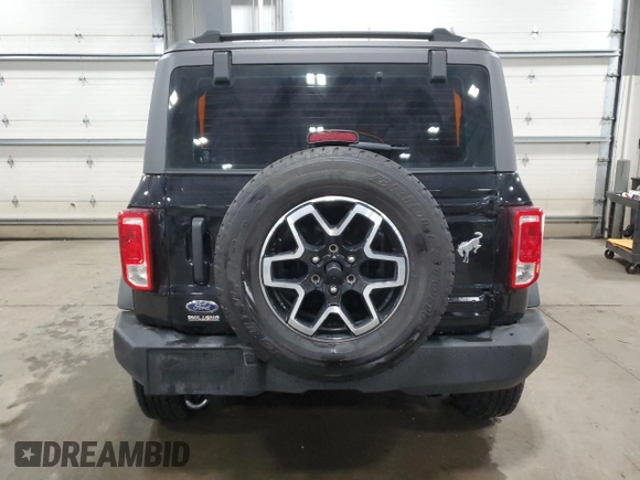 2023 Ford Bronco with VIN 1FMDE5AH7PLB26901, listed as a Copart auction lot 43171395 with 9,934 mi miles and Salvage title. Bid and sale history available at DreamBid. Image 6.