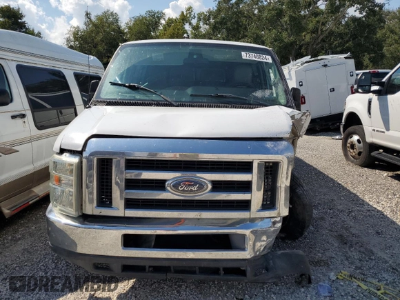 2009 Ford Econoline Passenger XL with VIN 1FBSS31L99DA06824, listed as a Copart auction lot 73740824 with 147,528 mi miles and Salvage title. Bid and sale history available at DreamBid. Image 5.