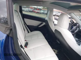 2020 Tesla Model 3 Long Range with VIN 5YJ3E1EB9LF601198, listed as a IAAI auction lot 41744287 with 70,322 mi miles and . Bid and sale history available at DreamBid. Image 8.
