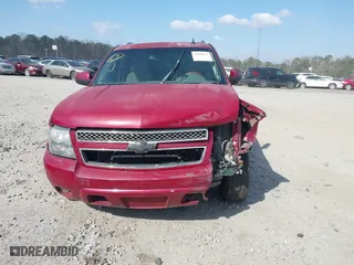 2007 Chevrolet Suburban LT with VIN 1GNFC16J97J355929, listed as a IAAI auction lot 41626223 with 186,644 mi miles. Bid and sale history available at carsss.com. Image 12.