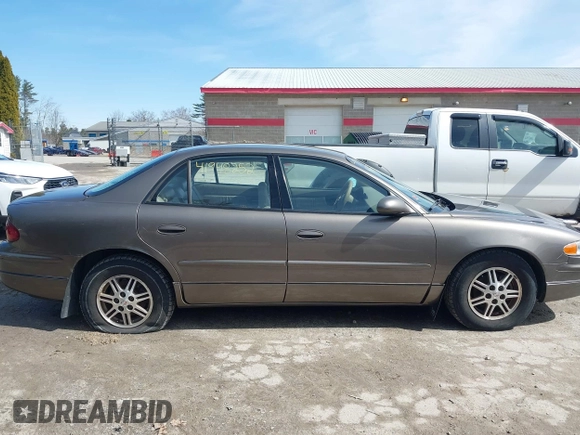 2003 Buick Regal LS with VIN 2G4WB52KX31227491, listed as a IAAI auction lot 41948252 with 153,030 mi miles. Bid and sale history available at carsss.com. Image 14.