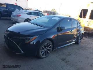 2021 Toyota Corolla Hatchback XSE with VIN JTNC4MBE0M3106000, listed as a IAAI auction lot 41278096 with 67,999 mi miles. Bid and sale history available at carsss.com. Image 2.
