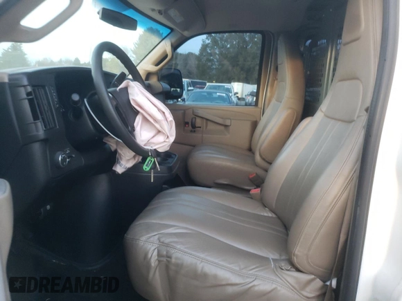 2016 Chevrolet Express Cargo with VIN 1GCWGAFF2G1254028, listed as a Copart auction lot 79596474 with Not provided miles and Salvage title. Bid and sale history available at DreamBid. Image 7.