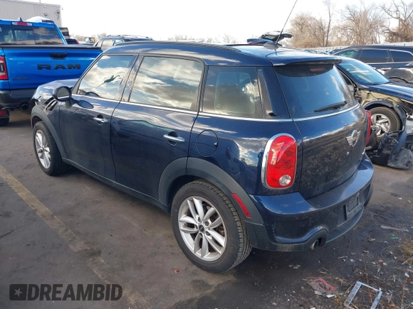 2013 MINI Countryman S with VIN WMWZC3C52DWP21475, listed as a IAAI auction lot 41215334 with 124,365 mi miles and . Bid and sale history available at DreamBid. Image 3.
