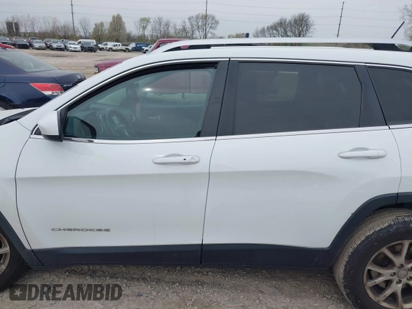 2014 Jeep Cherokee Latitude with VIN 1C4PJMCSXEW150735, listed as a IAAI auction lot 42020944 with 76,303 mi miles and . Bid and sale history available at carsss.com. Image 15.