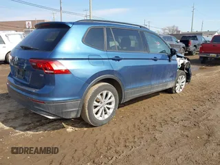 2018 Volkswagen Tiguan S with VIN 3VV1B7AX6JM108786, listed as a IAAI auction lot 41708099 with 162,289 mi miles and . Bid and sale history available at DreamBid. Image 4.