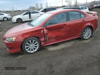 2009 Mitsubishi Lancer GTS z VIN JA3AU86W39U613656, wystawiony jako Copart lot #54614085 z przebiegiem 167 459 mil mil oraz Nie do naprawy • Non repairable. Historia ofert i sprzedaży dostępna na DreamBid. Obrazek 1.