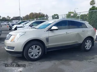 2015 Cadillac SRX Luxury Collection with VIN 3GYFNEE33FS548324, listed as a IAAI auction lot 42029979 with 70,372 mi miles. Bid and sale history available at carsss.com. Image 14.