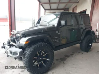 2019 Jeep Wrangler Unlimited Sahara with VIN 1C4HJXEG7KW661801, listed as a IAAI auction lot 40848731 with Not provided miles and . Bid and sale history available at DreamBid. Image 16.