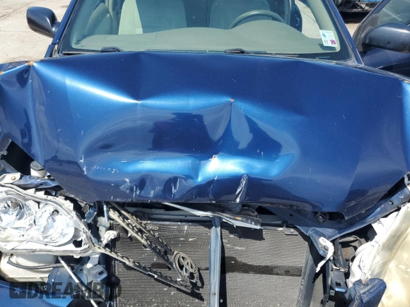 2007 Toyota Corolla CE z VIN JTDBR32E270124094, wystawiony jako Copart lot #58199945 z przebiegiem 115 398 mil mil oraz Szkoda całkowita • Salvage title. Historia ofert i sprzedaży dostępna na DreamBid. Obrazek 11.