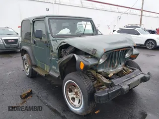 1999 Jeep Wrangler Sport with VIN 1J4FY19S6XP428003, listed as a IAAI auction lot 42149234 with 1 mi miles. Bid and sale history available at carsss.com. Image 1.
