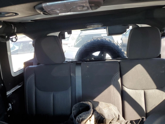 2014 Jeep Wrangler Unlimited Rubicon with VIN 1C4BJWFG1EL195612, listed as a Copart auction lot 47749415 with 35,878 mi miles and Salvage Title. Bid and sale history available at carsss.com. Image 8.