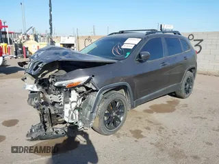 2014 Jeep Cherokee Latitude with VIN 1C4PJMCBXEW317384, listed as a IAAI auction lot 41621635 with 180,971 mi miles and . Bid and sale history available at DreamBid. Image 18.