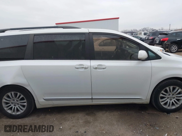 2016 Toyota Sienna XLE with VIN 5TDYK3DC2GS726677, listed as a IAAI auction lot 41609165 with 144,858 mi miles. Bid and sale history available at carsss.com. Image 13.