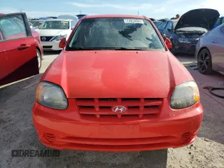 2005 Hyundai Accent GLS with VIN KMHCG45C15U596671, listed as a Copart auction lot 74834004 with 0 mi miles and Salvage Title. Bid and sale history available at carsss.com. Image 5.