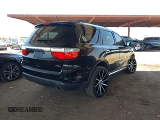 2013 Dodge Durango Crew with VIN 1C4RDHDG1DC508676, listed as a IAAI auction lot 42520380 with 126,250 mi miles and . Bid and sale history available at DreamBid. Image 4.