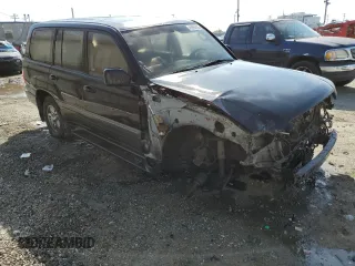 2001 Lexus LX 470 with VIN JTJHT00W613504449, listed as a Copart auction lot 45995455 with 229,056 mi miles and Salvage Title. Bid and sale history available at DreamBid. Image 4.
