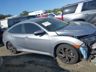 2019 Honda Civic Sport with VIN 19XFC2F88KE034868, listed as a IAAI auction lot 41913004 with 60,599 mi miles and . Bid and sale history available at DreamBid. Image 14.