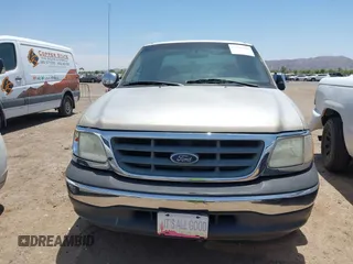 2000 Ford F-150 XL with VIN 1FTRX07W6YKB19703, listed as a IAAI auction lot 42375355 with Not provided miles and . Bid and sale history available at DreamBid. Image 6.
