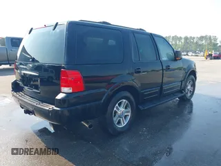 2004 Ford Expedition Eddie Bauer with VIN 1FMPU17L54LA74068, listed as a IAAI auction lot 41974666 with 292,308 mi miles. Bid and sale history available at carsss.com. Image 4.