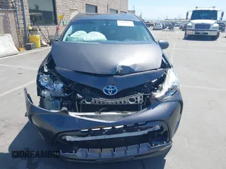 2015 Toyota Prius Two with VIN JTDZN3EUXFJ027926, listed as a IAAI auction lot 42036024 with 104,976 mi miles and . Bid and sale history available at DreamBid. Image 12.