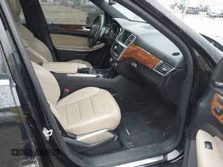 2014 Mercedes-Benz GL-Class GL 550 with VIN 4JGDF7DE1EA274612, listed as a IAAI auction lot 41710174 with 105,094 mi miles. Bid and sale history available at carsss.com. Image 5.