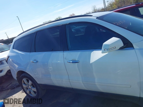 2017 Chevrolet Traverse LT with VIN 1GNKRGKD6HJ100575, listed as a IAAI auction lot 42084404 with 114,152 mi miles and . Bid and sale history available at DreamBid. Image 13.