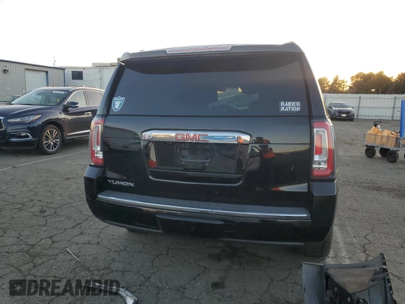 2018 GMC Yukon Denali with VIN 1GKS1CKJ3JR297926, listed as a Copart auction lot 88597415 with 0 mi miles and Salvage Title. Bid and sale history available at carsss.com. Image 6.