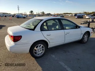 2001 Saturn SL z VIN 1G8ZK52771Z219294, wystawiony jako Copart lot #83155494 z przebiegiem 190 338 mil mil oraz Szkody całkowita. Historia ofert i sprzedaży dostępna na DreamBid. Obrazek 3.