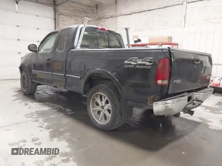 1997 Ford F-150 XL with VIN 1FTDX18W6VNB19712, listed as a IAAI auction lot 41740832 with 232,275 mi miles. Bid and sale history available at carsss.com. Image 3.