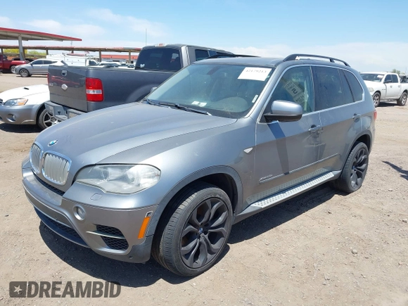 2013 BMW X5 xDrive50i with VIN 5UXZV8C56D0C15064, listed as a IAAI auction lot 42179213 with Not provided miles and . Bid and sale history available at DreamBid. Image 16.