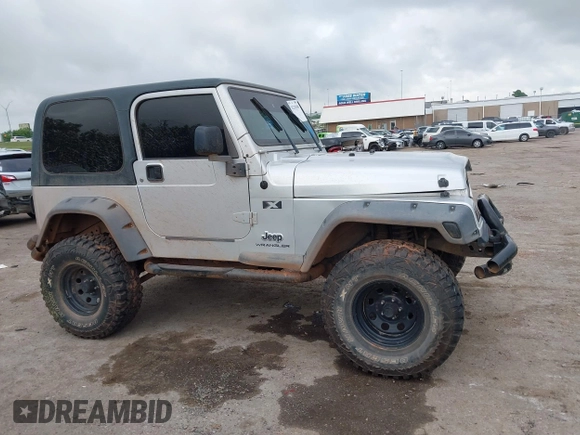 2004 Jeep Wrangler X with VIN 1J4FA39S24P701806, listed as a IAAI auction lot 42218100 with 72,757 mi miles and . Bid and sale history available at DreamBid. Image 13.