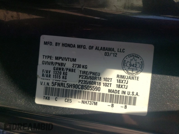 2012 Honda Odyssey Touring with VIN 5FNRL5H90CB505590, listed as a Copart auction lot 62566715 with 323,092 mi miles and Clean title. Bid and sale history available at DreamBid. Image 13.