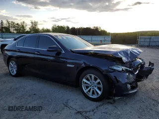 2015 BMW 5 Series 528i xDrive with VIN WBA5A7C58FG143147, listed as a Copart auction lot 52850195 with 130,528 mi miles and Salvage Title. Bid and sale history available at carsss.com. Image 4.