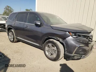 2024 Honda Pilot EX-L 7 Passenger with VIN 5FNYG2H58RB007819, listed as a Copart auction lot 77101344 with 2,829 mi miles and Salvage Title. Bid and sale history available at carsss.com. Image 4.