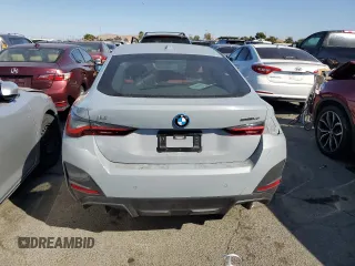 2022 BMW i4 eDrive40 z VIN WBY73AW0XNFN24679, wystawiony jako Copart lot #70213313 z przebiegiem 14 403 mil mil oraz . Historia ofert i sprzedaży dostępna na DreamBid. Obrazek 6.