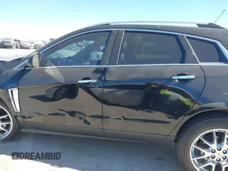2015 Cadillac SRX Premium Collection with VIN 3GYFNDE33FS531081, listed as a IAAI auction lot 41763596 with 157,455 mi miles. Bid and sale history available at carsss.com. Image 15.