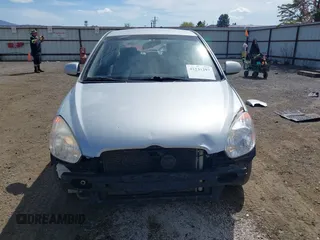 2010 Hyundai Accent GLS with VIN KMHCN4AC1AU476326, listed as a IAAI auction lot 42141297 with 203,607 mi miles. Bid and sale history available at carsss.com. Image 13.