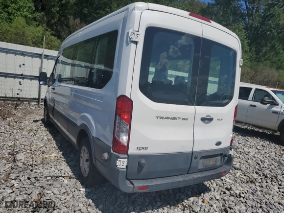 2015 Ford Transit Wagon XL with VIN 1FBZX2CM5FKB23517, listed as a Copart auction lot 72343484 with 92,934 mi miles and Salvage Title. Bid and sale history available at carsss.com. Image 2.