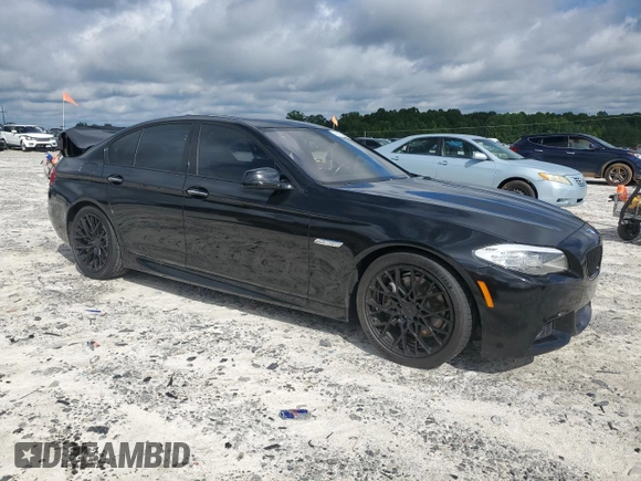 2013 BMW 5 Series 535i with VIN WBAFR7C57DC829343, listed as a Copart auction lot 61143005 with 127,779 mi miles and Salvage title. Bid and sale history available at DreamBid. Image 4.