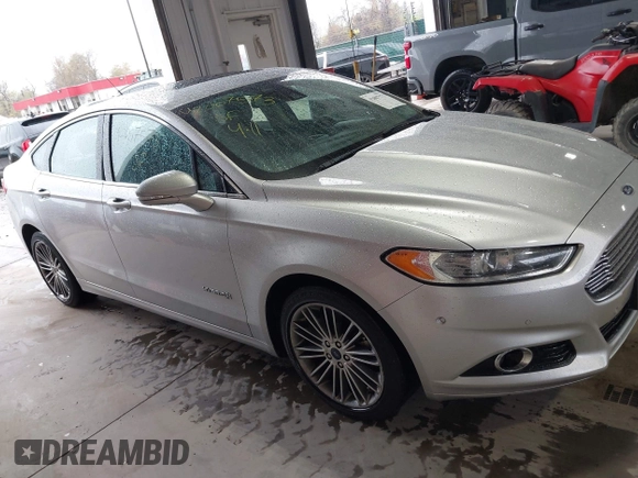 2013 Ford Fusion SE Hybrid with VIN 3FA6P0LU2DR319335, listed as a IAAI auction lot 42007573 with 135,099 mi miles. Bid and sale history available at carsss.com. Image 13.