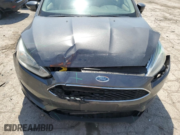 2015 Ford Focus SE with VIN 1FADP3F21FL349981, listed as a Copart auction lot 53460425 with 76,542 mi miles and Salvage title. Bid and sale history available at DreamBid. Image 11.