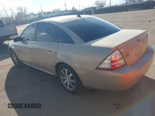 2008 Ford Taurus SEL with VIN 1FAHP24W38G111319, listed as a IAAI auction lot 41585092 with 216,419 mi miles. Bid and sale history available at carsss.com. Image 3.