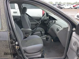 2004 Ford Focus SE with VIN 1FAFP34394W114485, listed as a IAAI auction lot 42737378 with 104,817 mi miles and . Bid and sale history available at DreamBid. Image 5.