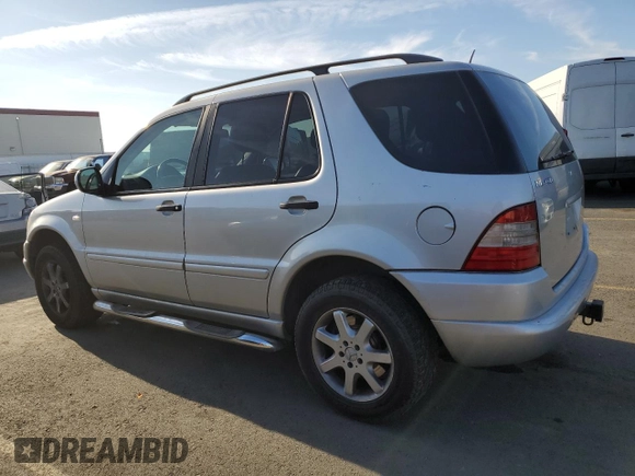 2000 Mercedes-Benz M 320/430/500 with VIN 4JGAB72E2YA185234, listed as a Copart auction lot 83479684 with 209,491 mi miles and Clean title. Bid and sale history available at DreamBid. Image 2.