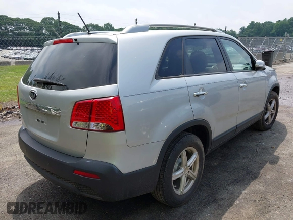 2013 Kia Sorento LX with VIN 5XYKT4A20DG360991, listed as a IAAI auction lot 42258999 with 129,278 mi miles and . Bid and sale history available at DreamBid. Image 4.