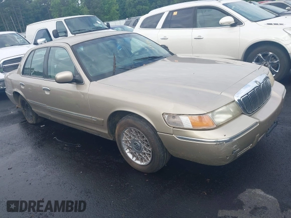 1999 Mercury Grand Marquis GS z VIN 2MEFM74W4XX645430, wystawiony jako IAAI lot #42154522 z przebiegiem 152 306 mil mil oraz . Historia ofert i sprzedaży dostępna na DreamBid. Obrazek 1.