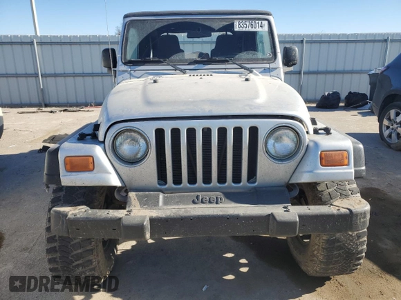 2003 Jeep Wrangler X with VIN 1J4FA39S63P304582, listed as a Copart auction lot 83576014 with 139,002 mi miles and Salvage Title. Bid and sale history available at carsss.com. Image 5.