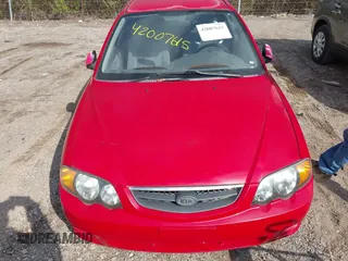 2002 Kia Spectra GS with VIN KNAFB161425076186, listed as a IAAI auction lot 42007615 with 90,269 mi miles. Bid and sale history available at carsss.com. Image 6.